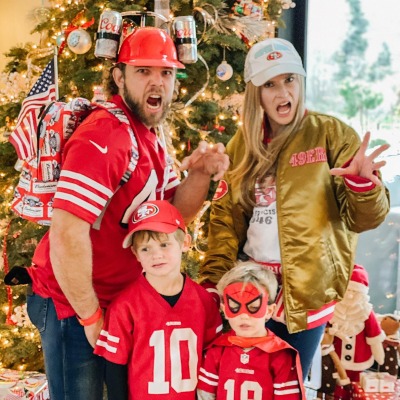 Max Thieriot and Lexi Murphy with their kids supporting 49ers.